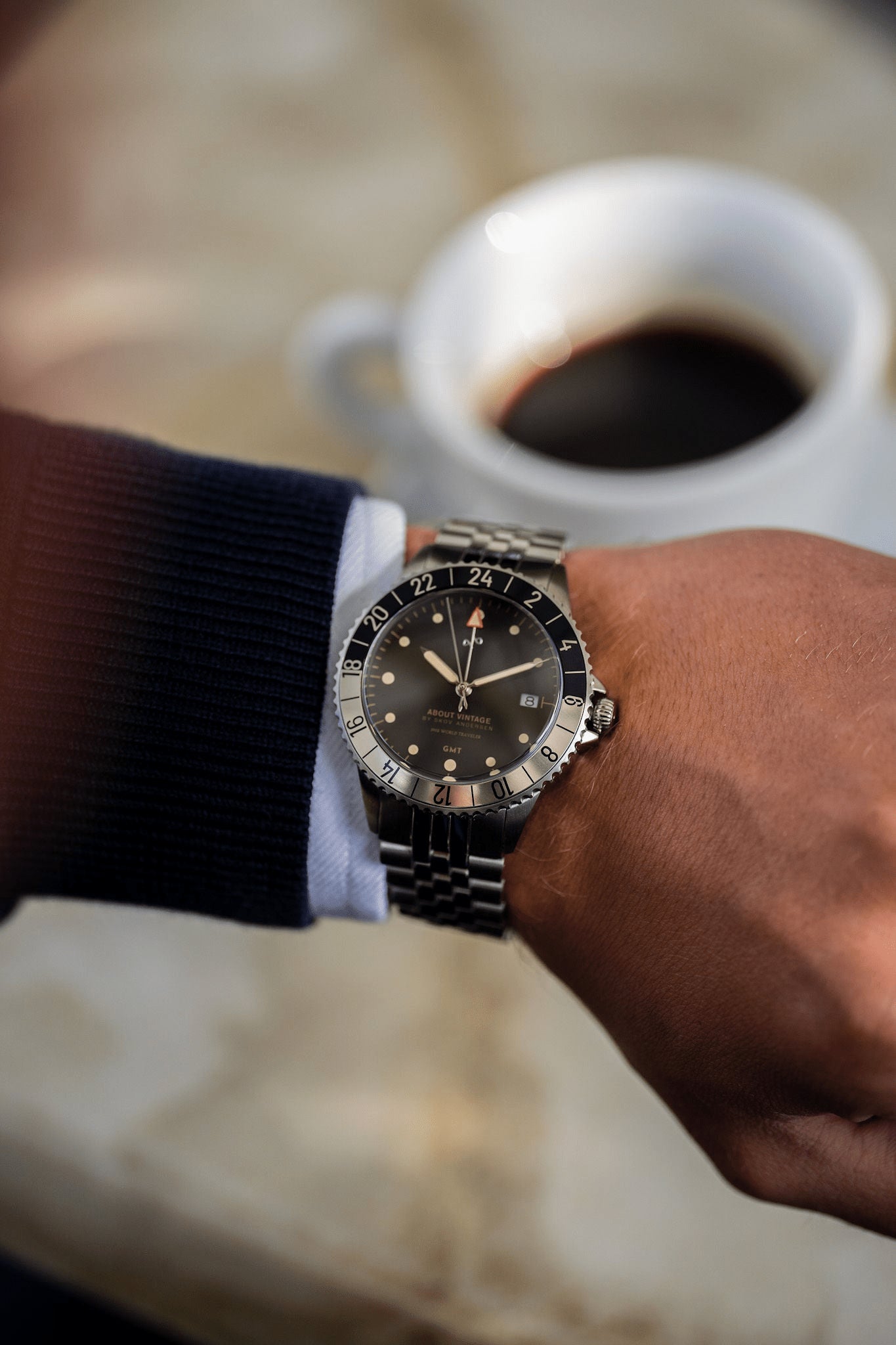 1982 GMT World Traveler by AV86 GMT quartz watch with sapphire crystal, stainless steel case and bracelet in refined setting