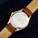 1968 Sixtyeight by AV86 vintage-inspired dress watch with sapphire crystal, polished case, and brown leather strap reverse detailing