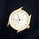 1968 Sixtyeight by AV86 vintage-inspired dress watch with sapphire crystal, gold case, white dial, and refined minimalist markers