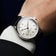 1968 Sixtyeight by AV86 vintage-inspired dress watch with sapphire crystal, elegant dial, and black leather strap on wrist