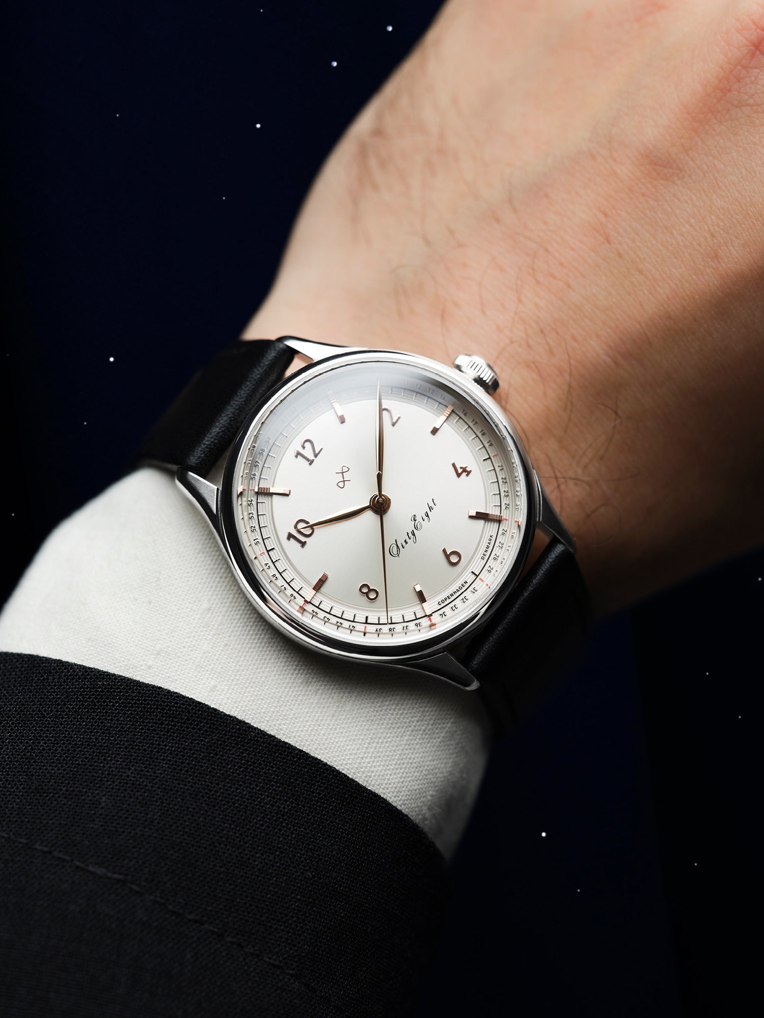 1968 Sixtyeight by AV86 vintage-inspired dress watch with sapphire crystal, elegant dial, and black leather strap on wrist